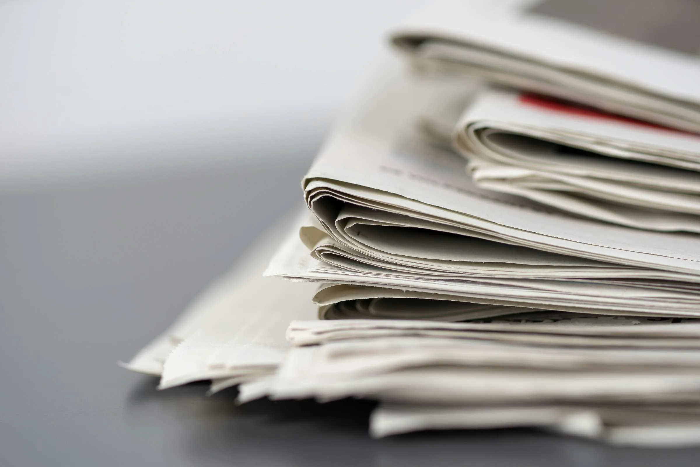 A stack of newspapers.